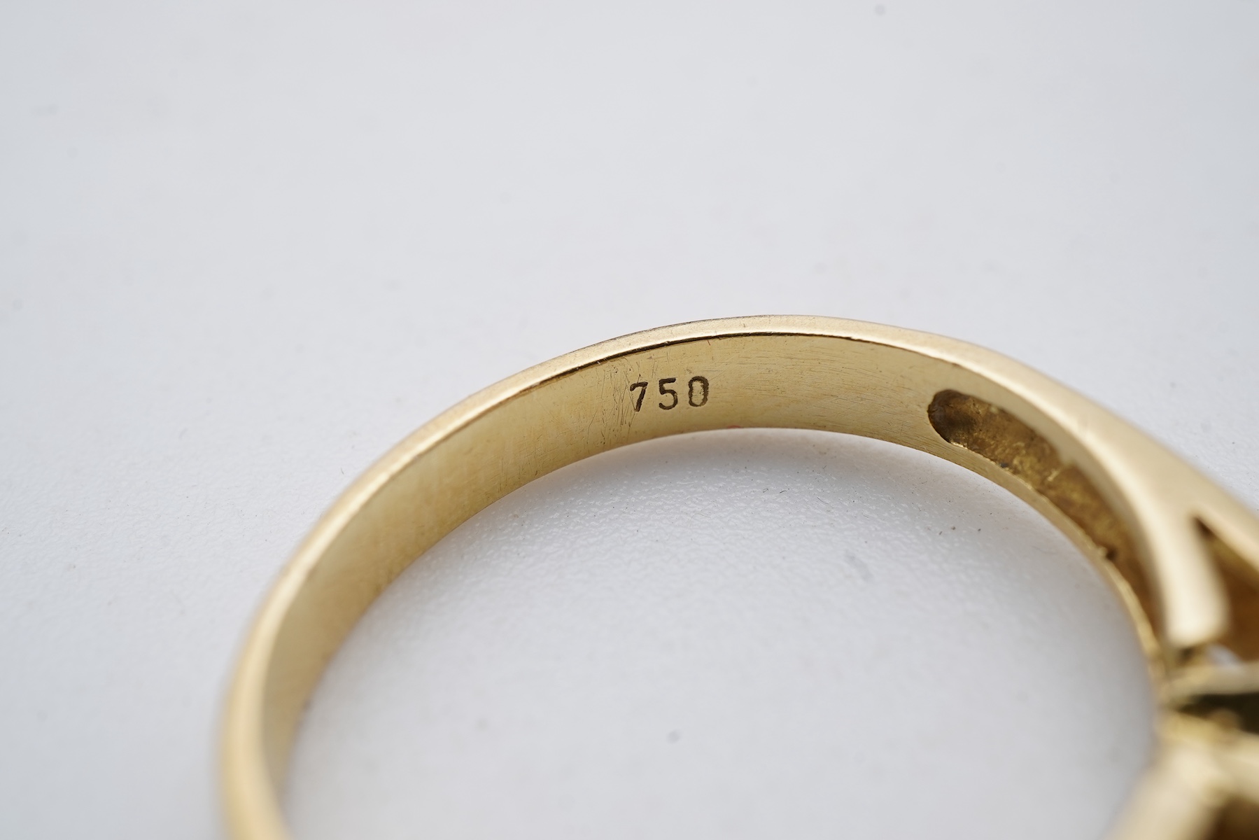 A diamond solitaire ring